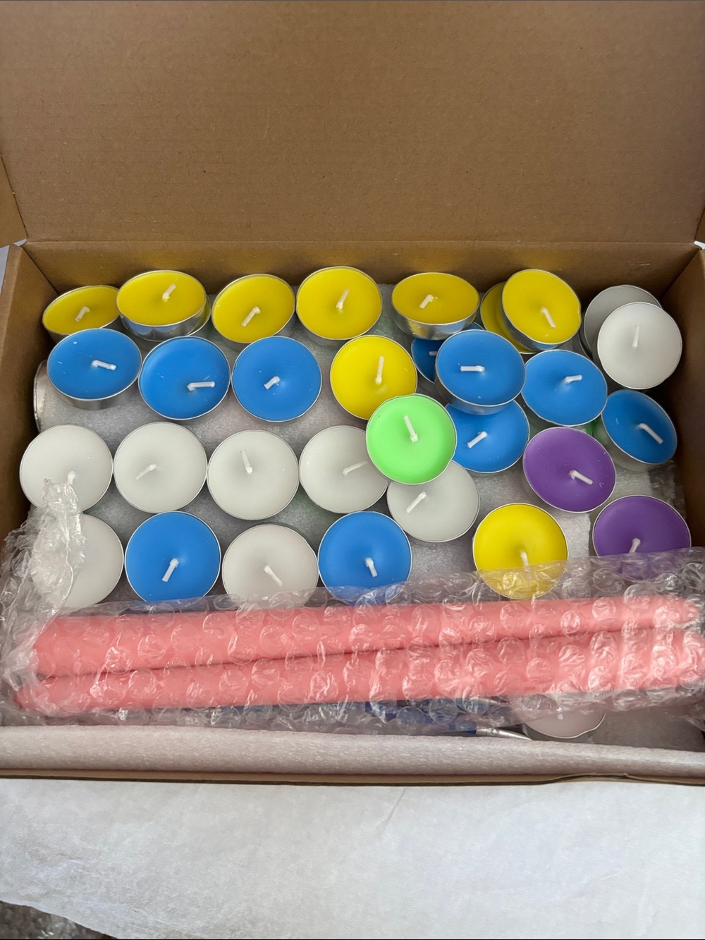 Multipack Unscented Tea Lights with Pink Taper Accent Candles